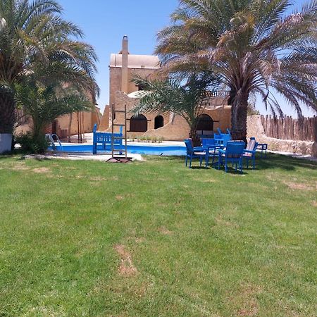Villa 7 Al Fayyūm Exterior foto